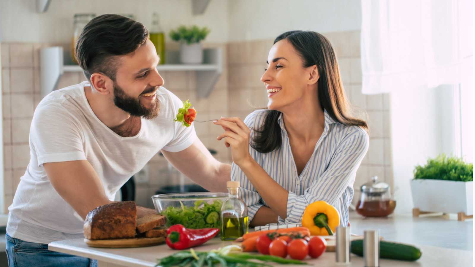 4 Woman With Husband In Kitchen Shutterstock