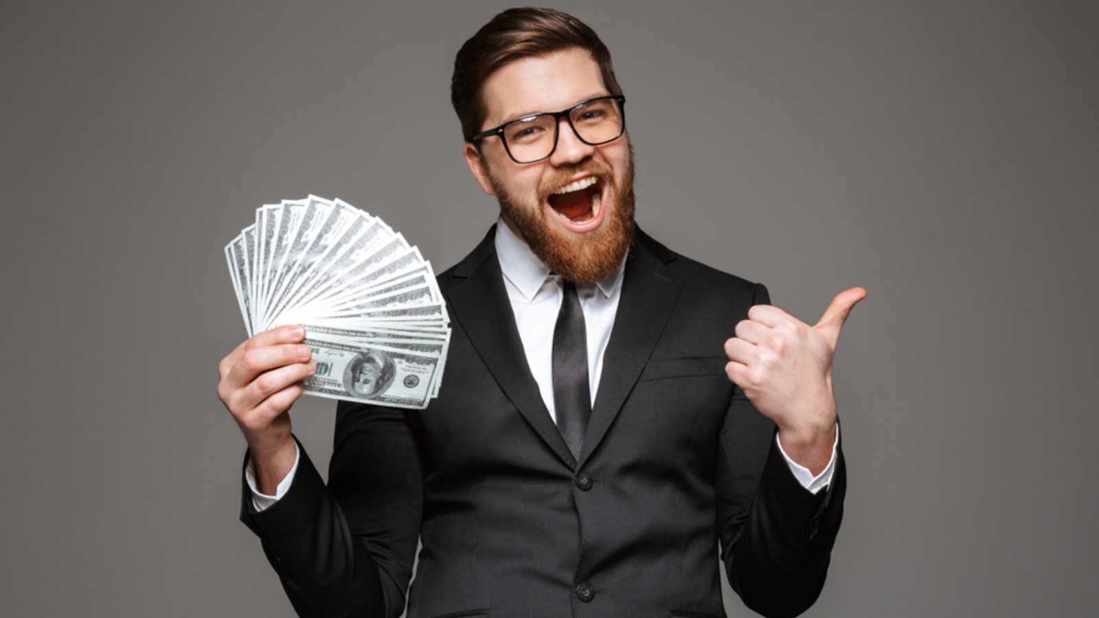9 Man With Money Shutterstock