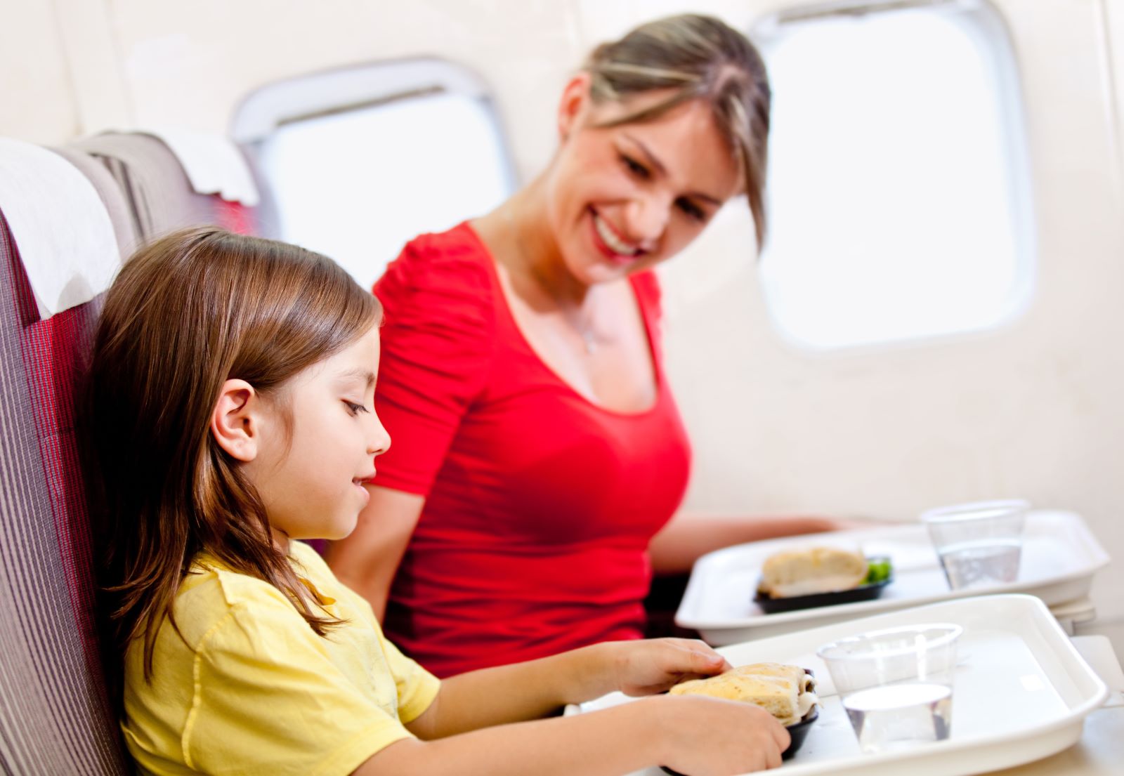 Girl Eating Plane Mea;