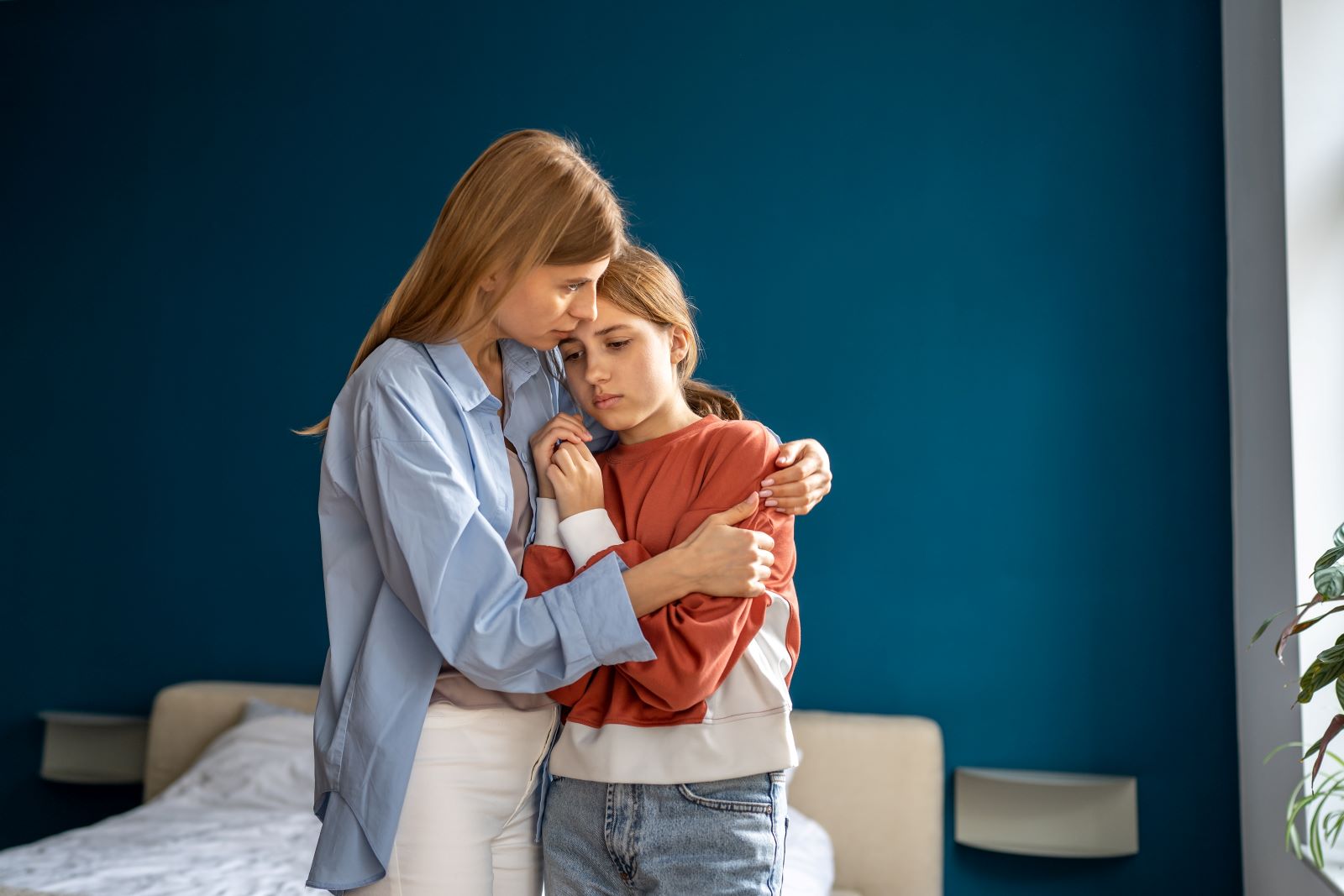 Mom Comforting Daughter