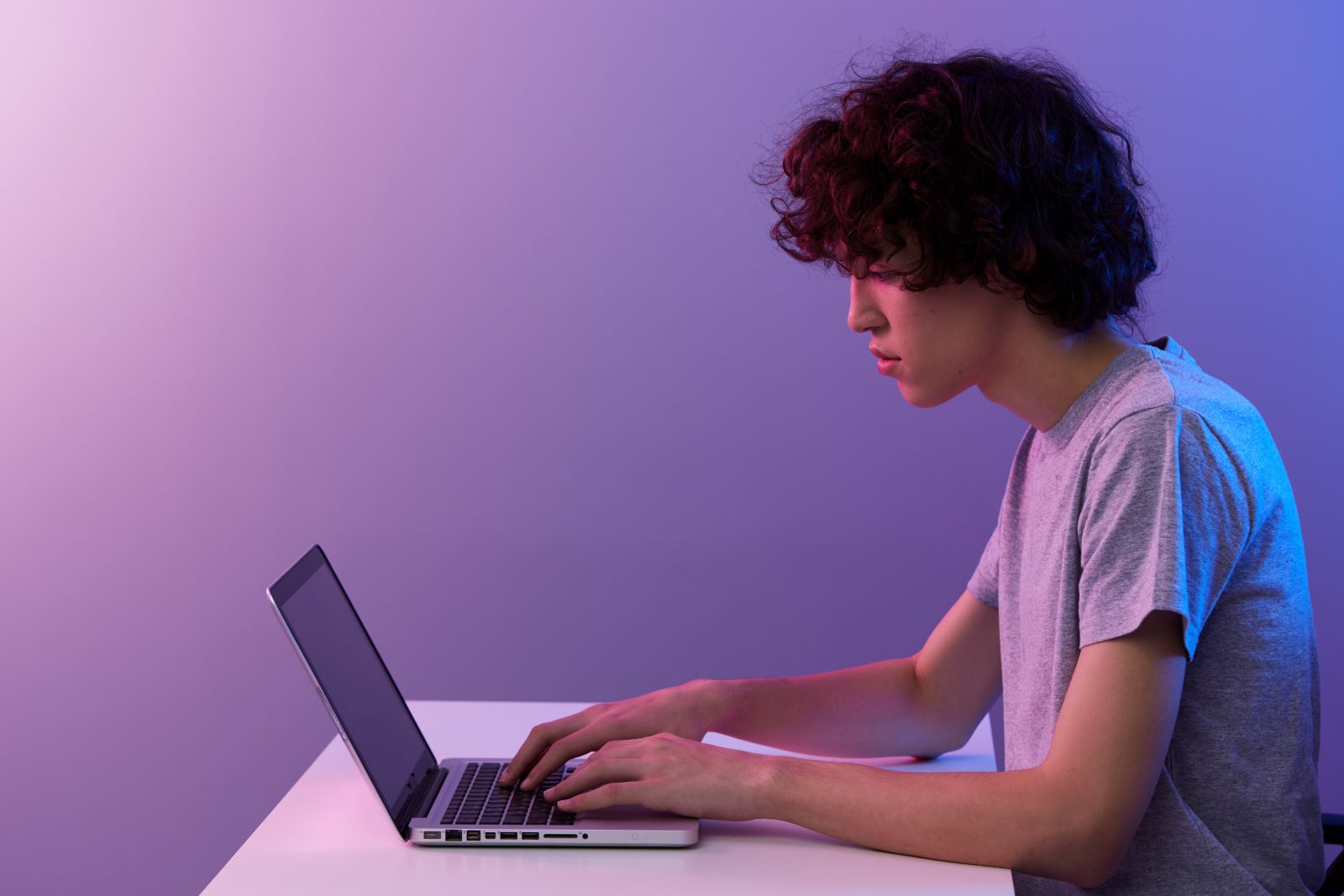 Teen Using Laptop